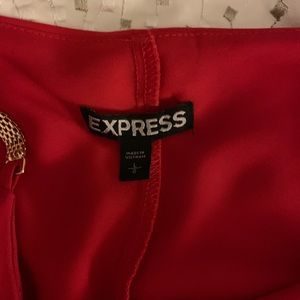 Polyester tank with gold chain straps.